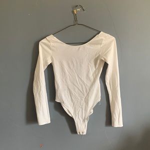 Im selling a jumpsuit that’s very pretty and white